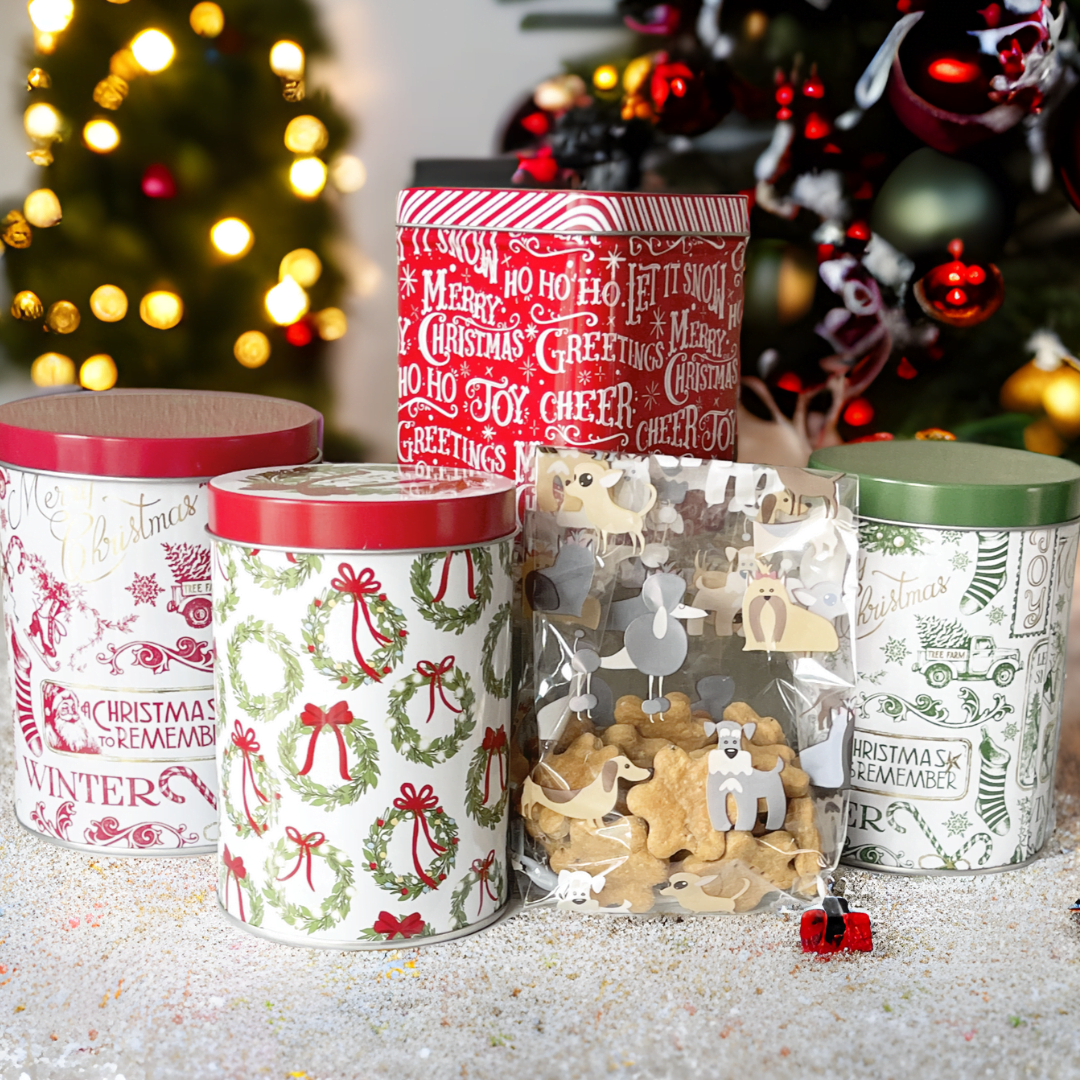 collection of holiday tins under the Christmas tree